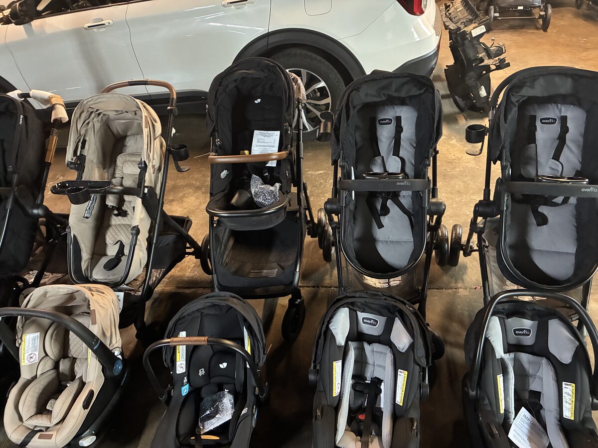 Lineup of infant car seats in the warehouse